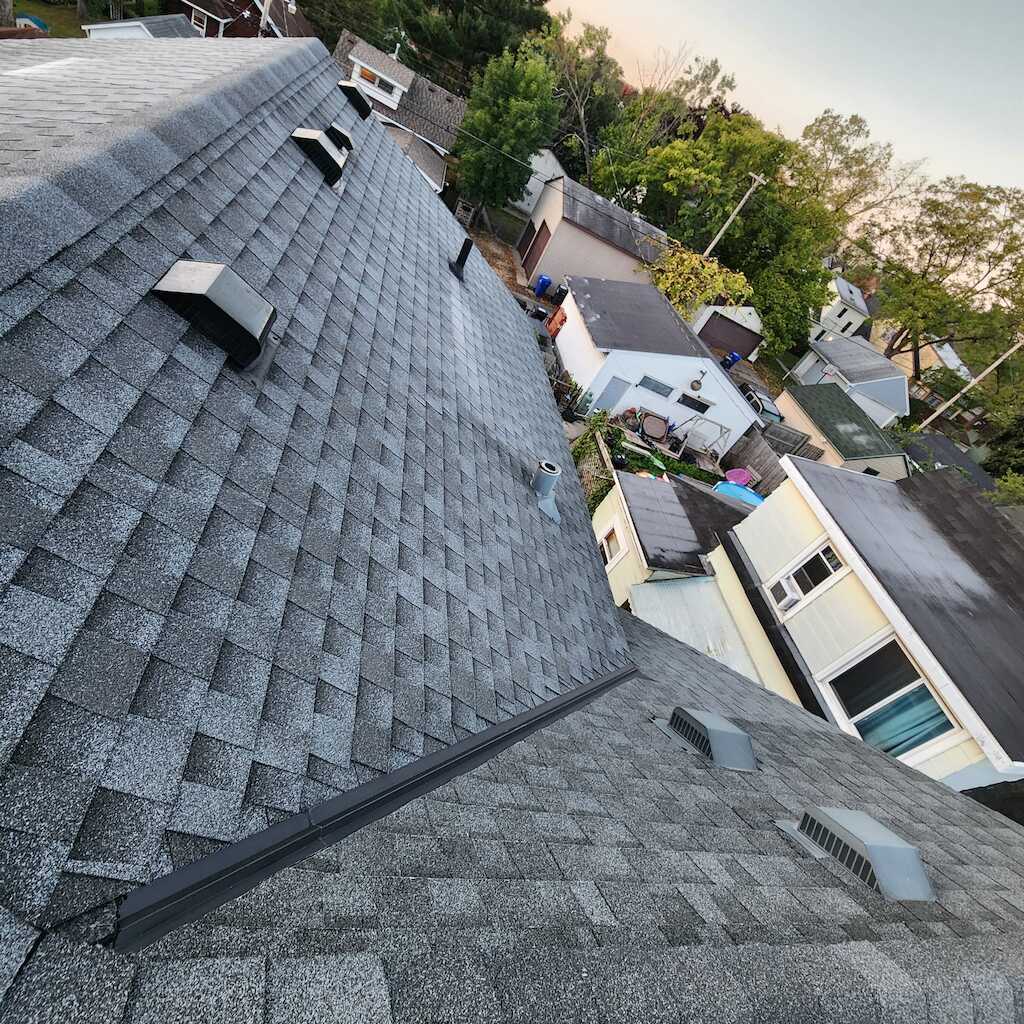 Re-roof with GAF shingles Lifetime warranty Storm Damage